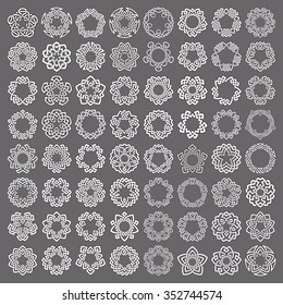 Mega set of round frames. Sixty four patterned circles. Pentagonal decorative elements for logo or monogram design. Mandalas collection of white lines with black strokes on gray background.