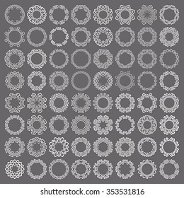 Mega set of round frames. Sixty four patterned circles. Octagonal decorative elements for logo or monogram design. Mandalas collection of white lines with black strokes on gray background.