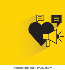 megaphone, heart and speech bubble drop on yellow background