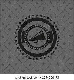 megaphone icon inside black emblem