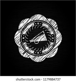 megaphone icon inside chalk emblem written on a blackboard