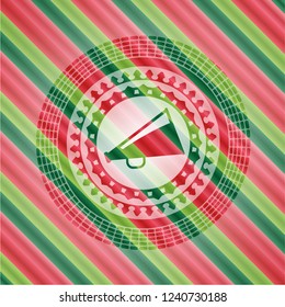 megaphone icon inside christmas colors style badge.