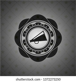 megaphone icon inside dark emblem