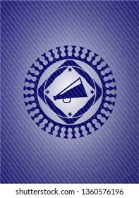 megaphone icon inside emblem with denim high quality background