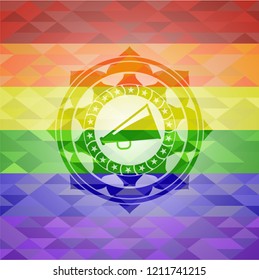 megaphone icon inside emblem on mosaic background with the colors of the LGBT flag