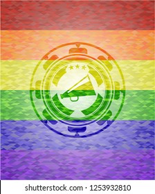 megaphone icon inside emblem on mosaic background with the colors of the LGBT flag