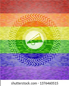 megaphone icon inside emblem on mosaic background with the colors of the LGBT flag