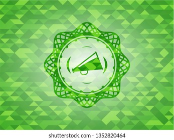 megaphone icon inside green mosaic emblem
