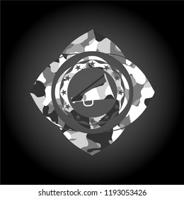 megaphone icon inside grey camo texture