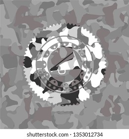 megaphone icon inside grey camouflage texture