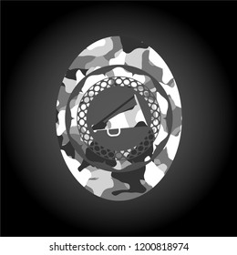 megaphone icon inside grey camouflaged emblem
