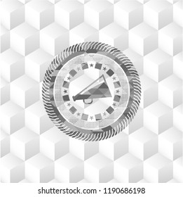 megaphone icon inside grey emblem with cube white background