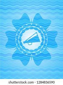 megaphone icon inside light blue water wave emblem.