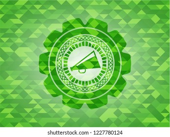 megaphone icon inside realistic green mosaic emblem