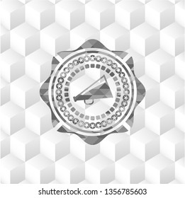 megaphone icon inside realistic grey emblem with geometric cube white background
