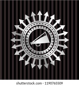 megaphone icon inside silver emblem