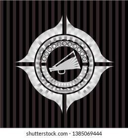 megaphone icon inside silvery shiny emblem