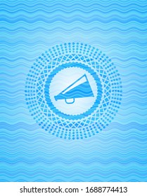 megaphone icon inside water wave style badge.