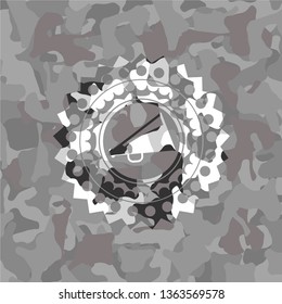 megaphone icon on grey camo pattern