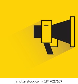megaphone with shadow on yellow background