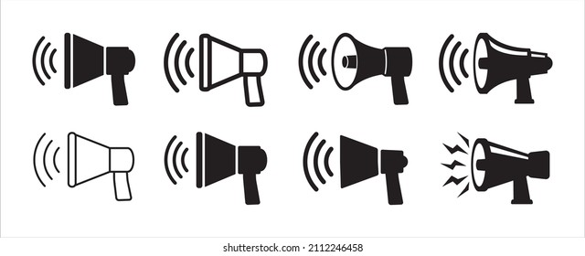 Megaphone and speaker horn vector icons set. Symbol of shouting, scream, noise, public speech freedom, advertise, advertising, and broadcast. Simple flat design illustration.