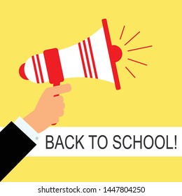 Megaphone and speech bubble with back to school word on yellow background. Vector graphic illustration.