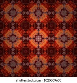 Mehndi design. Tracery seamless pattern. Vector curved doodling background. Ethnic colorful doodle texture in brown, orange and red colors.