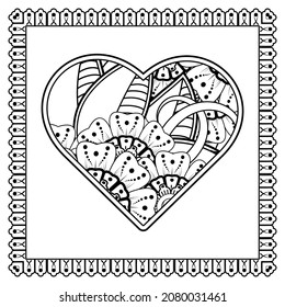 Flor de Mehndi con marco en forma de corazón. decoración étnica oriental, adorno de doodle.