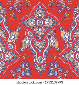 Mehndi flowers and leaves pattern grouped into stylized lotus. Seamless floral background with traditional paisley decorative element. Red colored almond-shaped henna ornament. Mandala or buta textile