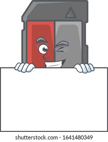 Memory card cartoon character with funny face hides behind a board