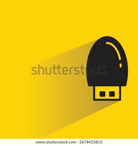 memory thumb drive icon with shadow on yellow background