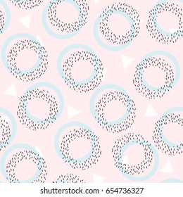 Memphis design. Geometric abstract seamless pattern. Fashionable black, white and blue figures and dots circles on a pink background. Trend of the 80s, 90s. Modern print. Funky background.