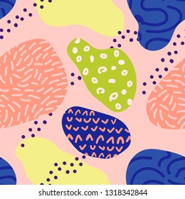 Memphis style abstract colorful pattern. Vector seamless texture with chaotic spots, blots and dots. Modern background in bright colors, coral, pink, blue, yellow, green. Repeat fashionable design