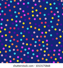 Memphis style polka dots seamless pattern on dark blue background.