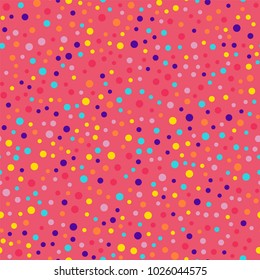 Memphis style polka dots seamless pattern on pink background.