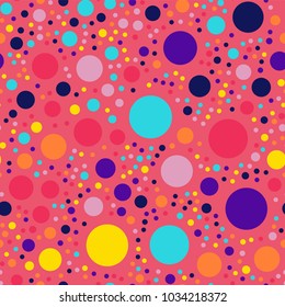 Memphis style polka dots seamless pattern on pink background.