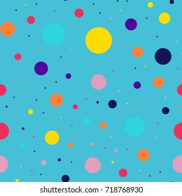 Memphis style polka dots seamless pattern on blue background.