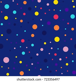 Memphis style polka dots seamless pattern on dark blue background.