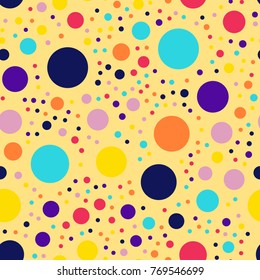 Memphis style polka dots seamless pattern on yellow background.