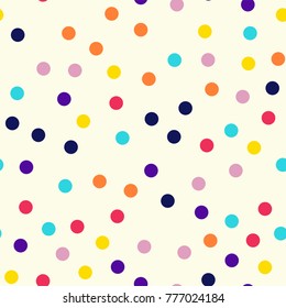 Memphis style polka dots seamless pattern on milk background.
