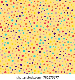 Memphis style polka dots seamless pattern on yellow background.