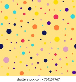 Memphis style polka dots seamless pattern on yellow background.
