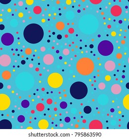 Memphis style polka dots seamless pattern on blue background.