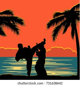 Men demonstrate karate on the shore of the ocean.