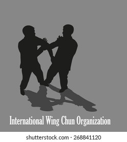 Men are engaged in the Kung fu Wing Chun.