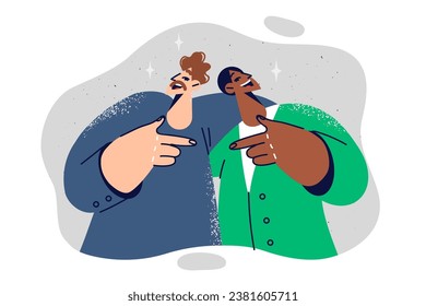 Men friends hug and point at buddy, rejoicing at long-awaited meeting and opportunity to communicate. Friends from university laughing to demonstrate lack of racial prejudice and discrimination