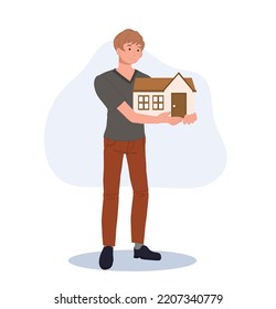 Un hombre sostiene la casa en sus manos. concepto de propietario de la casa. Ilustración del vector