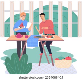 Men making vegan meal together. Male friends preparing vegetarian food on kitchen table. Culinary with family, food preparation at home concept. People cooking with groceries and kitchenware