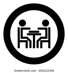 Men playing at the table black icon in circle