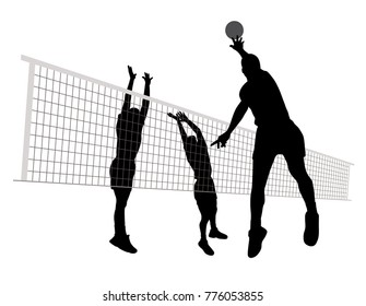 Men playing volleyball 